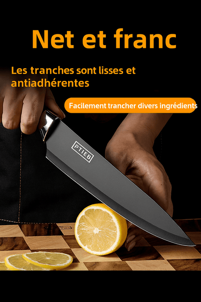 Découpe net et Franc avec un couteau de cuisine noir en acier inoxidable.